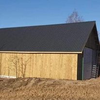 Bilde av Stålbygg med trekledning